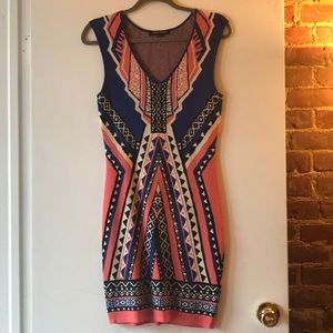 Curve hugging, fitted dress